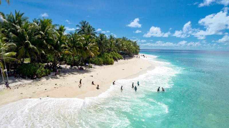 People enjoying in a beach at Maldives
